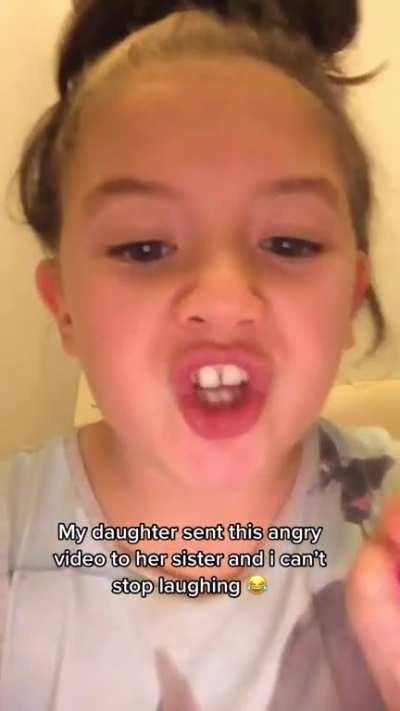 Sending angry video message to her sister for ruining it for her
