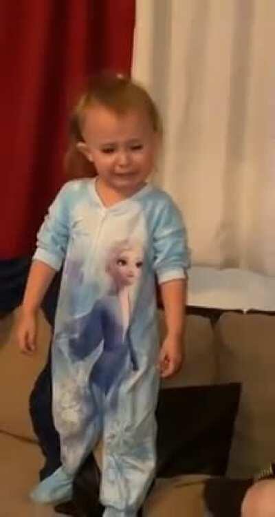 Dad pretends to eat toddler's sock