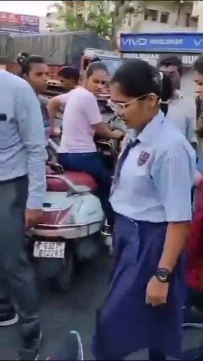 Female students confronted the harasser and beat him with belts in Ahmedabad.