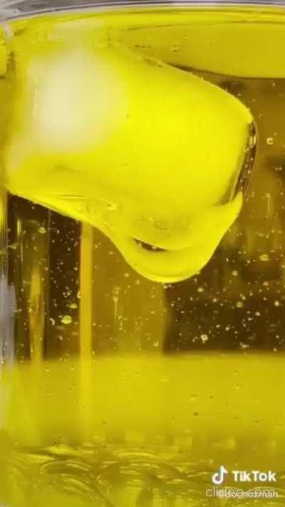 Ice melting in oil.