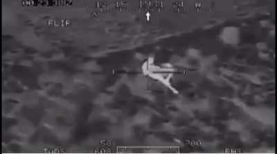 Retreating Taliban fighter gets shot in the leg and falls in a ditch, then is shot in the head by U.S Forces (Afghanistan unknown date)