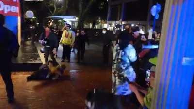 Cop violently shoving an unarmed person from behind for sport