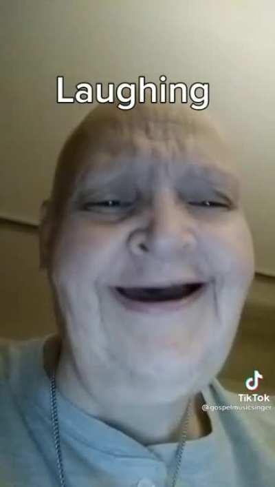 Tom standing over Christina at the bottom of the stairs