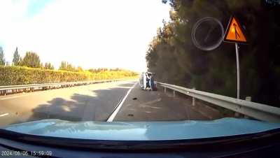 An suv is trying to exit from the passing lane