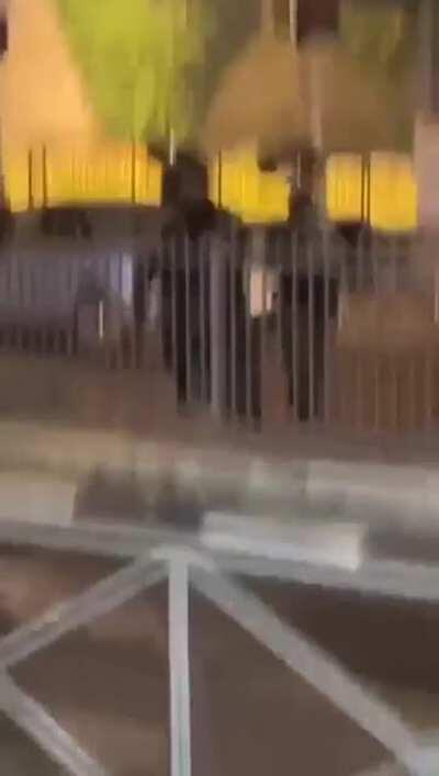 Soldier shooting a man filming directly