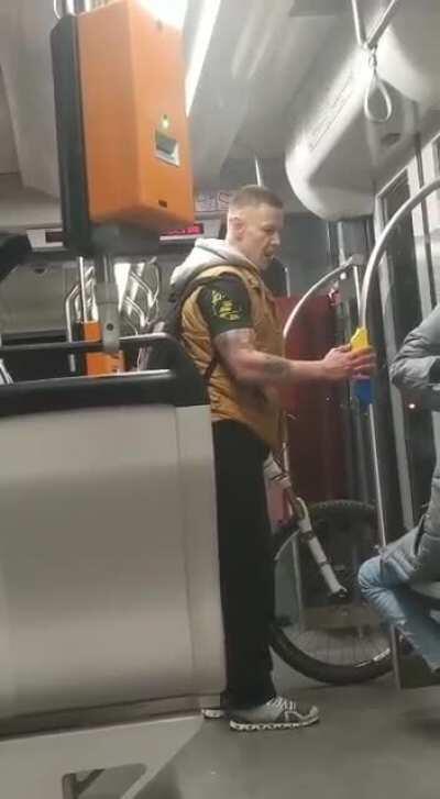 German hurls racism at a 17-year-old Syrian refugee. He then spits and kicks him.