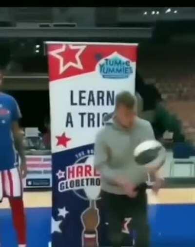 Fan guy over smarts at spinning basketball