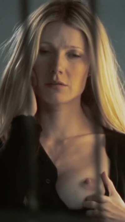 Gwyneth Paltrow showing someone her breast