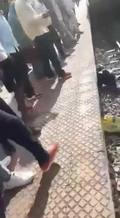 Man falls on Train Tracks