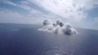 The US Navy captures the video of a bomb being detonated underwater for a full ship shock trial onboard the USS Gerald R. Ford (CVN 78)
