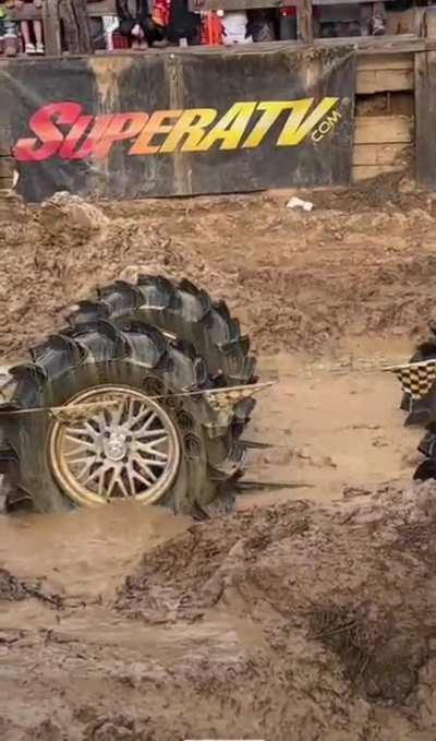 Side by side flips in mud pit