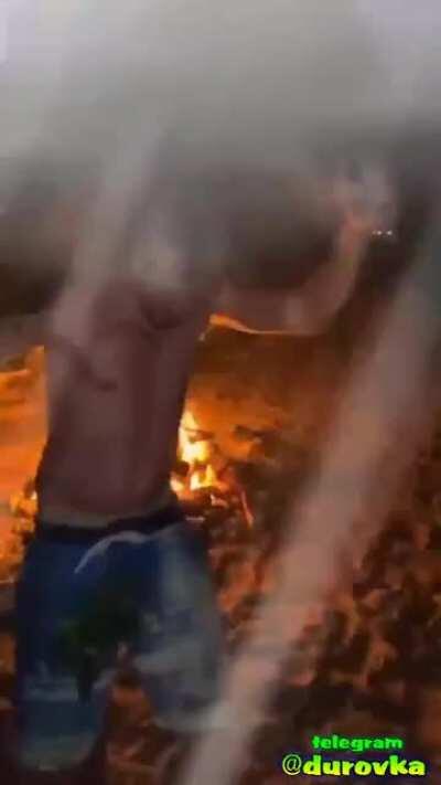 Drunken fun by the fire