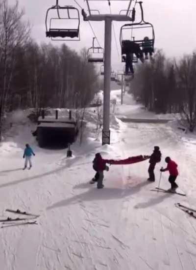 Kid falling of a ski lift