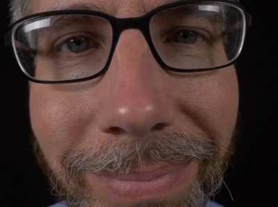 guy blankly stares at the camera