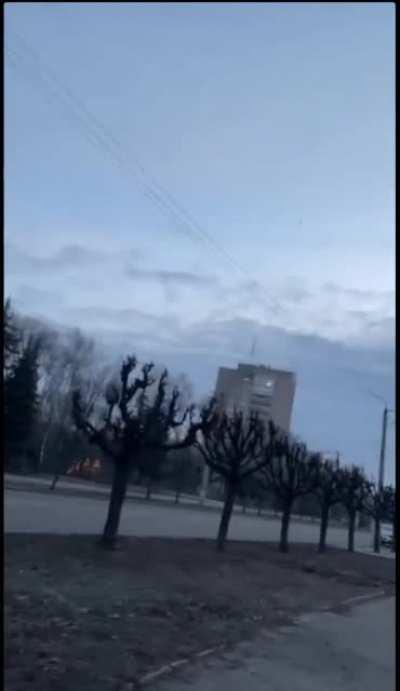 Russian missile flies over a journalist