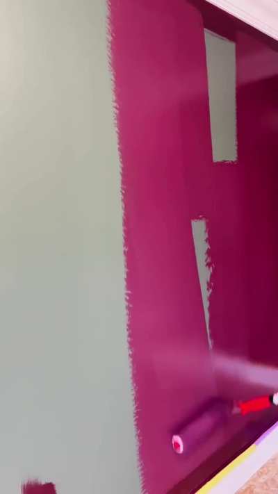 Painting a wall in Brinjal shade