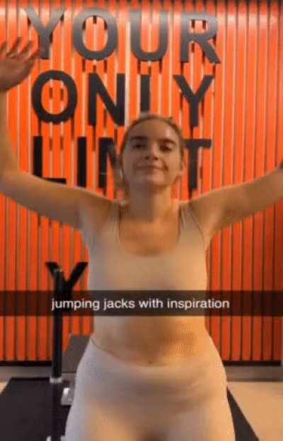 Natalie doing jumping jacks