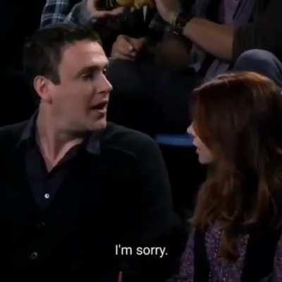 I just noticed the guys in the background passing a sandwich as well.