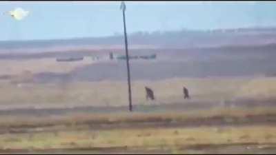 Free Syrian Army scores a direct ATGM hit on a YPG/kurdish militia Humvee in Ain Isa. Occupants of the Humvee try to flee while burning. North Syria November 2021.
