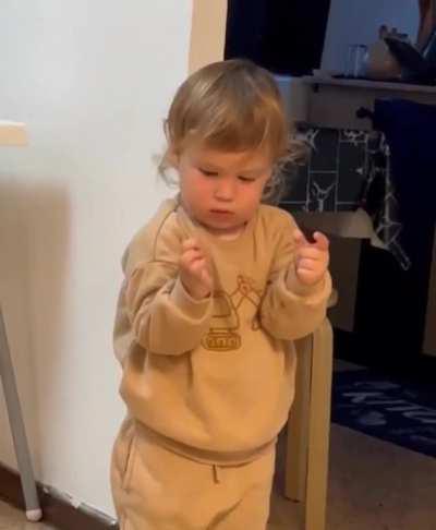 Baby boy figures out how to give thumbs up