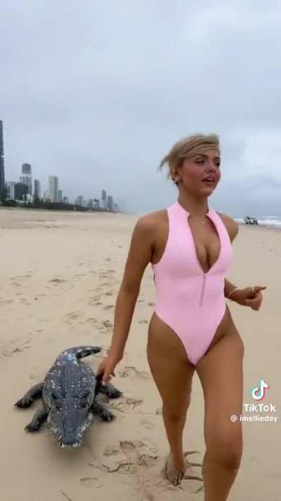 Aussie babe runs her croc