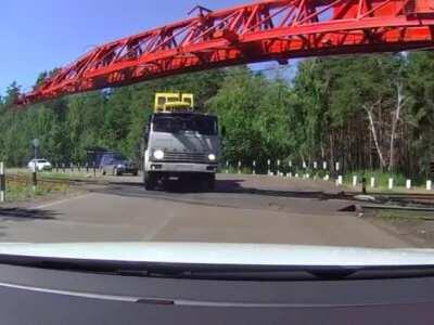 Impatient driver vs a massive train