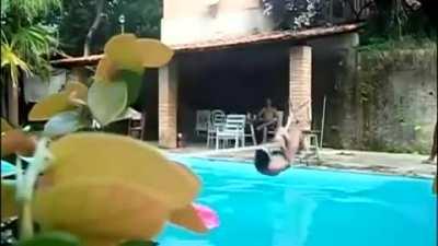 WCGW thightroping over a swimming pool