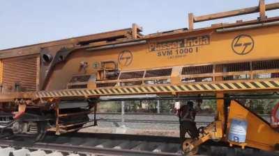 Track laying machine.