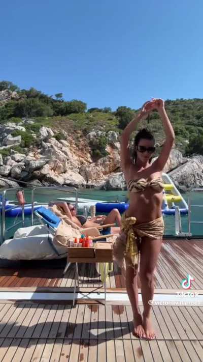 Stassie completely unbothered in the background of Vic's Tiktok