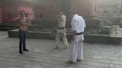 Kam fu master kicked shirtless guy into oblivion.