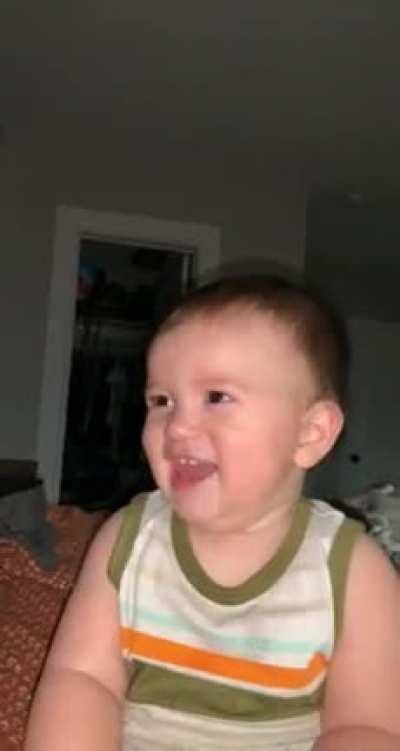 This chunky baby trying to pretend he is crying. He got caught!