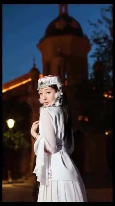 Helping her with her poses.