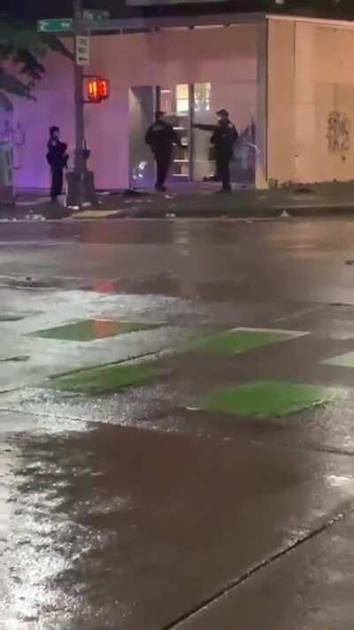 Seattle Police Dept appear to be smashing windows (looting?) all by themselves.