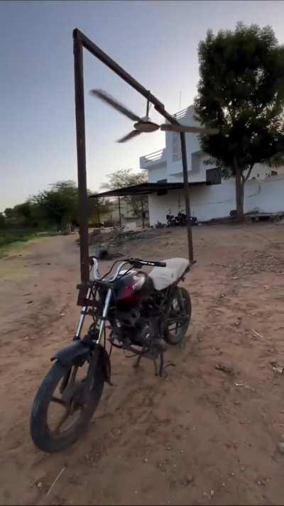 Ceiling fan on a motorcycle. Who thought this was a good idea