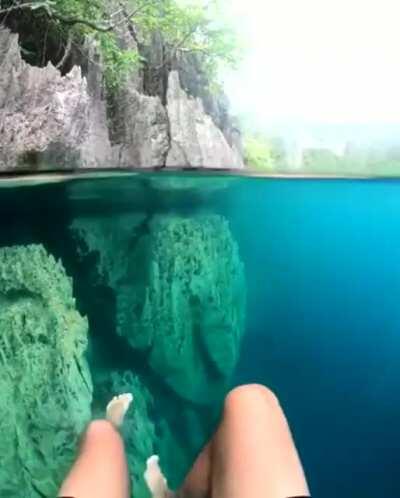 Crystal clear deep lake in the Philippines