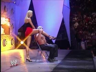 That time Stacy Keibler distracted Test and cost him his match by giving Scott Steiner a lapdance (RAW 2003)