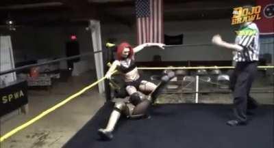 Pricilla Kelly using her opponent as a seat