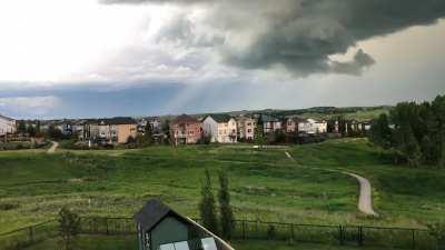 Twistin’ the night away. No funnel cloud but darned close IMO! Taken at Sage Hill about five minutes before the alert.