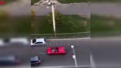 Idiot in a red McLaren tries to overtake on the inside