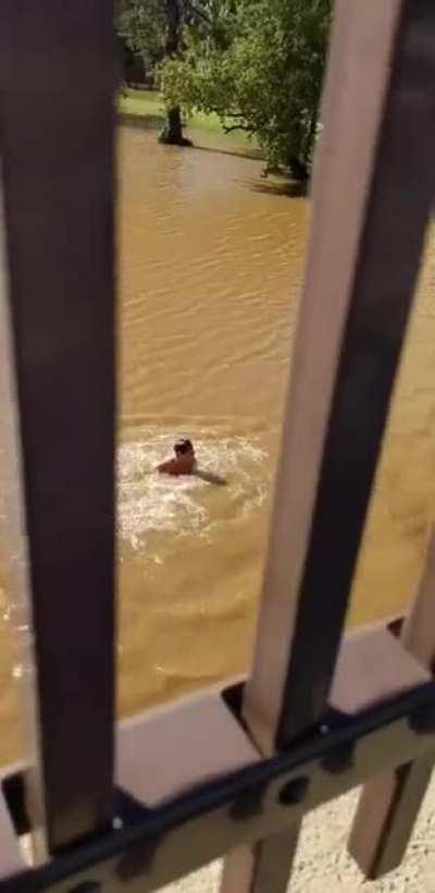 Man Flipping into 676 Swimming Pool