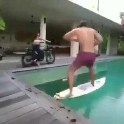 Towing a surfer through a pool