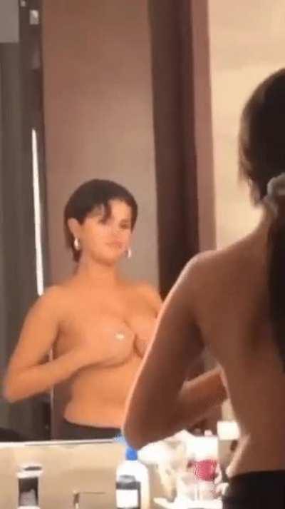 Selena Gomez groping her tits