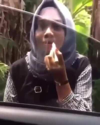 To use a car window as a mirror