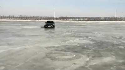 Filming a car driving towards you on ice