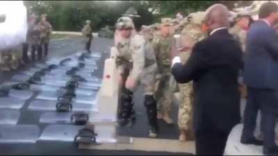 As more shields go down, more applause breaks out. -National Guard in Nashville at the state Capitol.