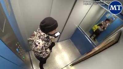 Russian prankster glues a portrait of Putain in an elevator and films the reactions