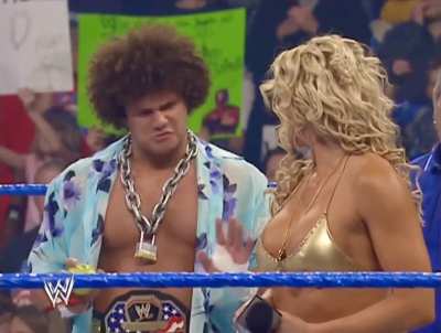Torrie Wilson gets hit on by Carlito