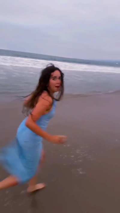 Maya running on the beach - July 2025