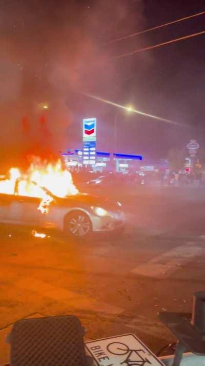 Stolen g37 burned while another stolen G37 does donuts while 3 more stolen G37s sit off to the side