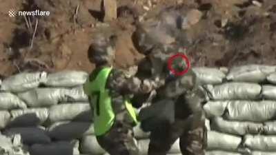 Military recruit saved after dropping live grenade at his feet